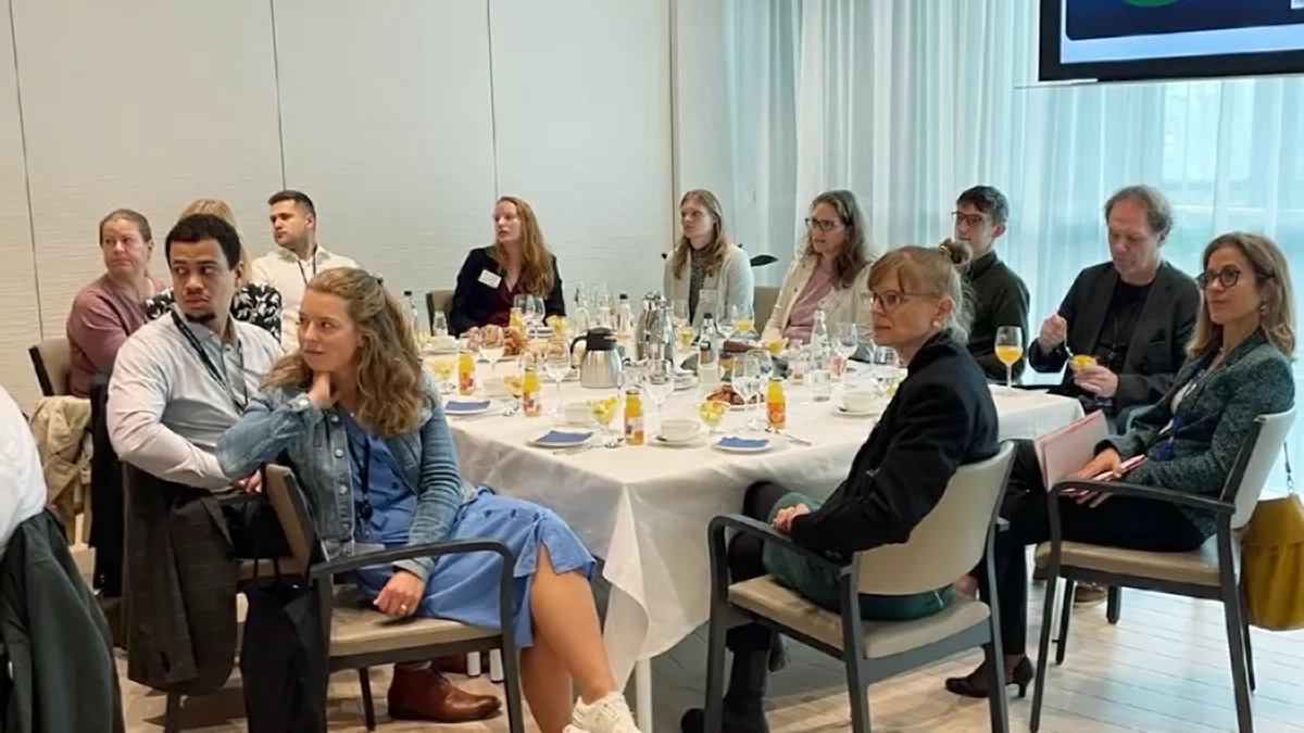 Group of people at the breakfast table