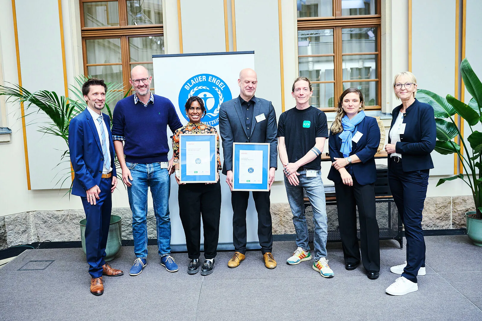 7 people at the award ceremony for the first Blue Angel certification for resource- and energy-efficient cloud software from Nextcloud Server and the Green Metrics Tool